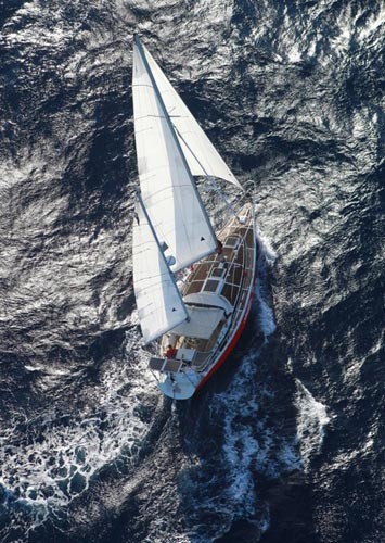 Laura Dekker on her Jeanneau Ginfizz ketch Guppy small ©  SW